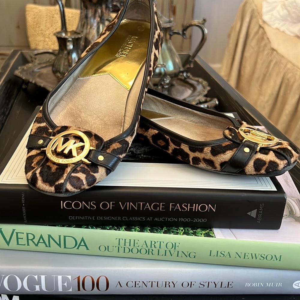 Michael Kors ballet animal print flats.